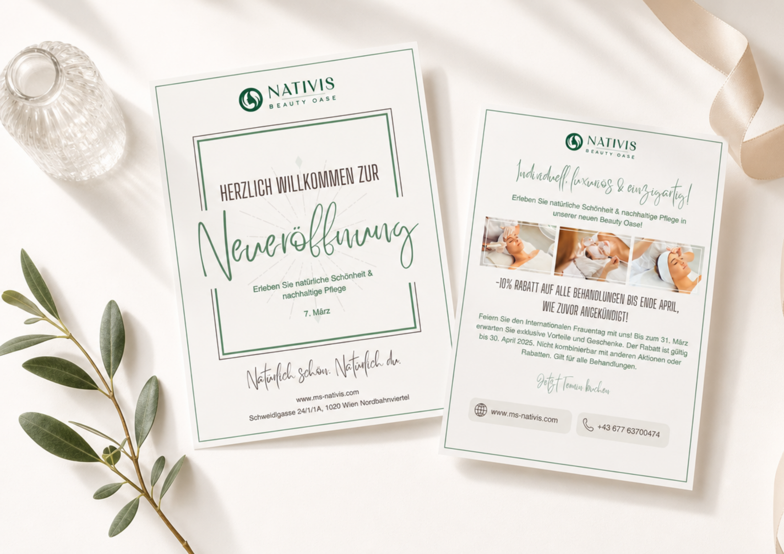 Front and back of the Nativis opening flyer styled on cream fabric with olive branches