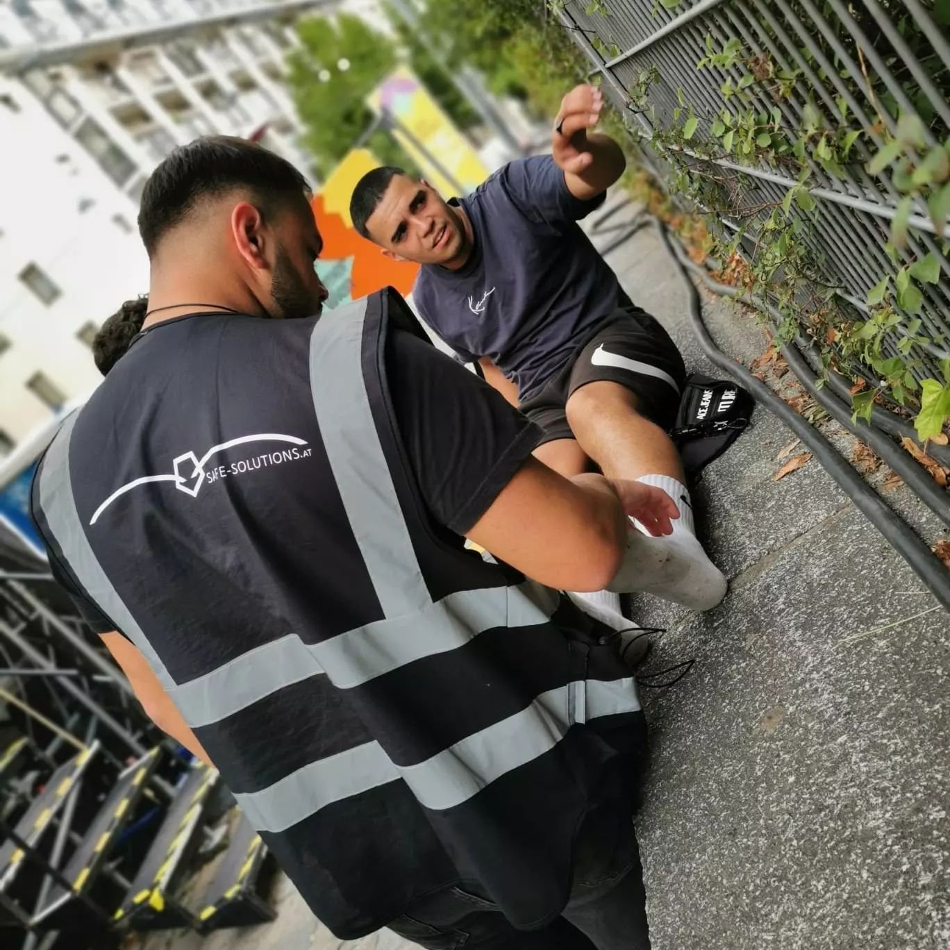 Safe Solutions staff in hi-vis vests working at an outdoor event